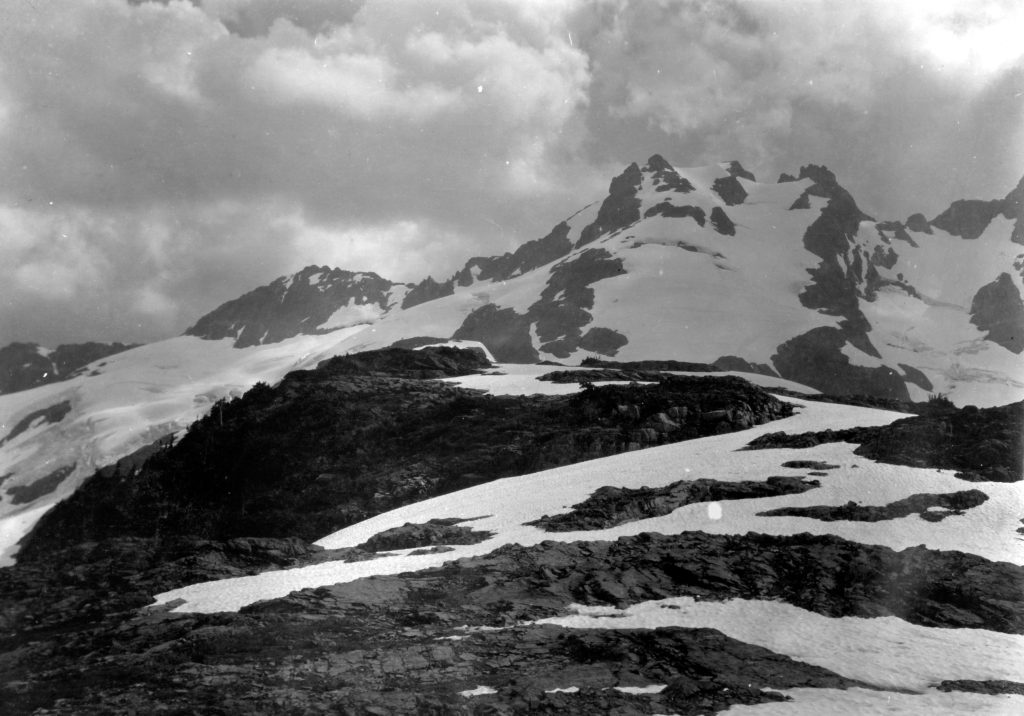 On Price Pass looking at Margaret Peak (left) and the Misthorns (right) 1910.