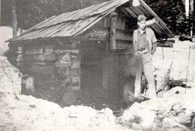 Bill Bell standing outside Tommy Anderson’s Cabin 1928