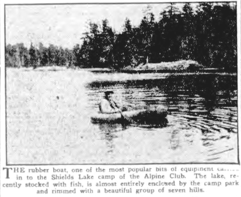 The rubber boat, one of the most popular bits of equipment carried in to the Shields Lake camp of the Alpine Club. The lake, recently stocked with fish, is almost entirely enclosed by the camp park and rimmed with a beautiful group of seven hills. 