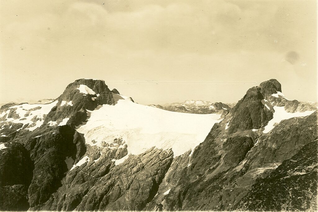 The Cliffe Glacier nestled between The Red Pillar (left) and Argus Mountain (right) 1934 – Bill Bell photo