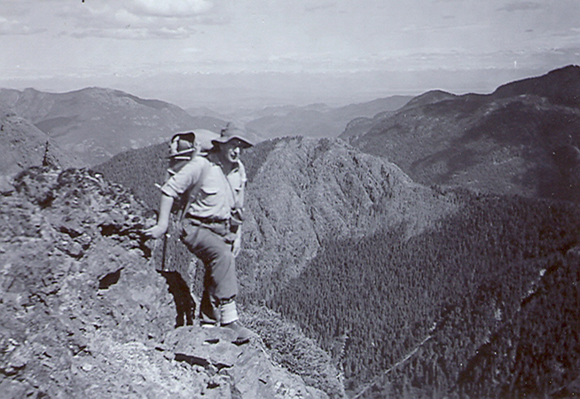 Bill Lash on the summit of Elkhorn looking towards Campbell River 1949 – Charles Nash photo.