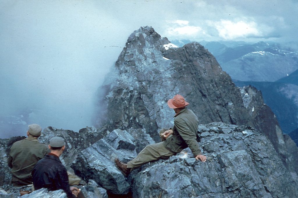 Syd Watts, Bill Lash and Mallory Lash looking towards the main summit of Mt. Colonel Foster from the Southeast Peak 1954 – Patrick Guilbride photo.