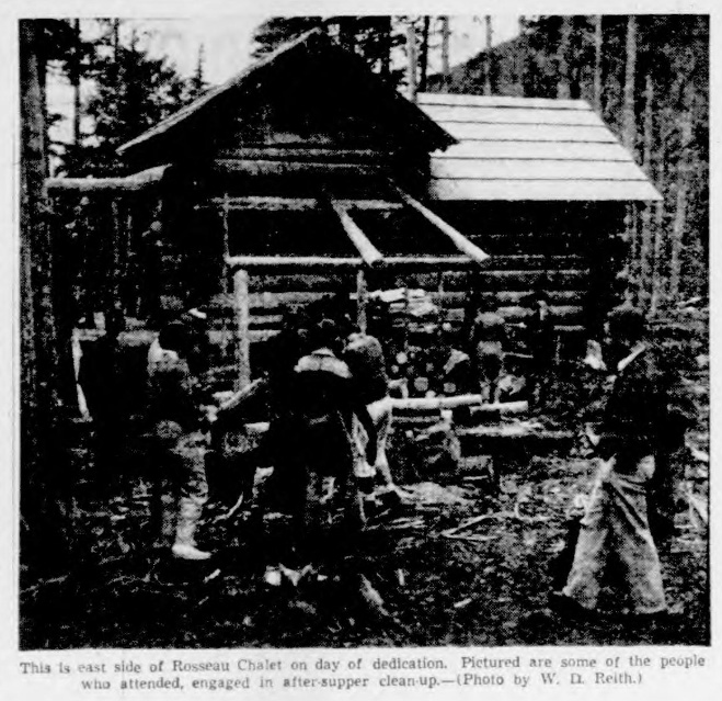 This is east side of Rosseau Chalet on day of dedication. Pictured are some of the people who attended, engaged in after-supper clean-up.—(Photo by W. D. Reith.)
