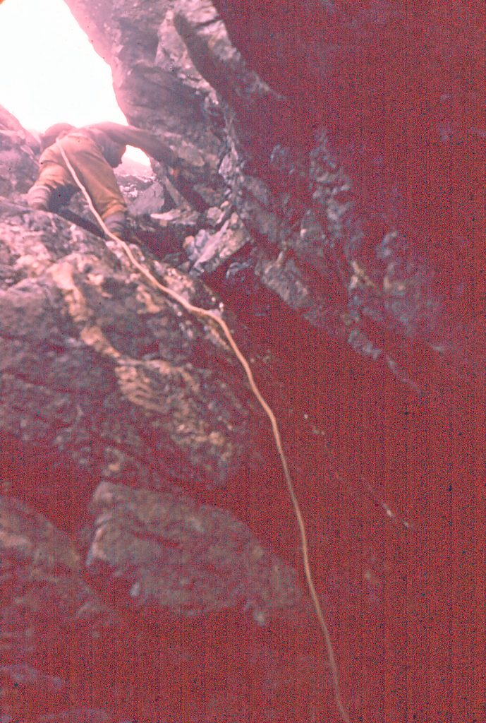 Climbing the gully on route to the Southwest summit of Mt. Colonel Foster 1957 - Karl Ricker photo.