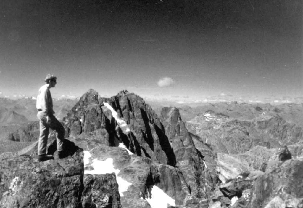 Bob Tustin standing on the summit of Rambler Peak, 1966 - Bob Tustin photo.