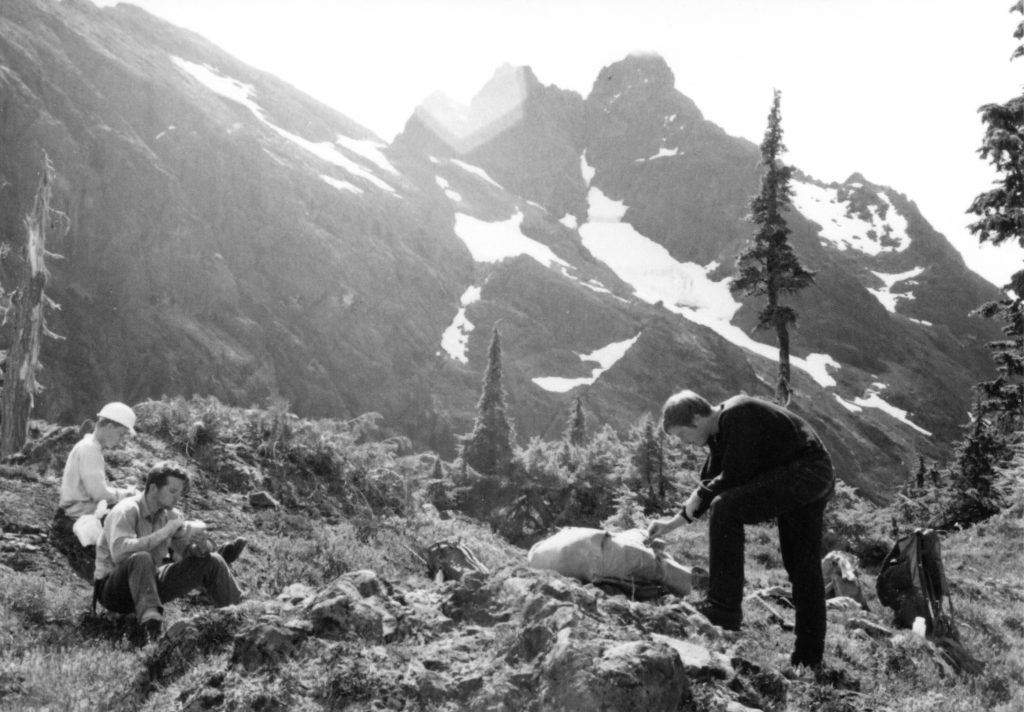 Climbers (L to R - Doug Jones, Mike Walsh, Bob Tustin) in the upper branch of the East Elk River below Rambler Peak, 1966 - Bob Tustin photo.