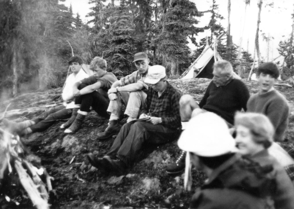 Syd Watts (hat), John (writing) and Doreen Cowlin (lower right) and others at camp on Elk Pass, 1966 - Bob Tustin photo.