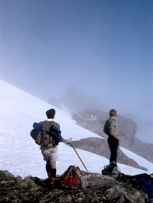 Ron Facer and Blair Paterson looking at Rugged Mountain through the mist 5 August 1968 – Ralph Hutchinson photo.