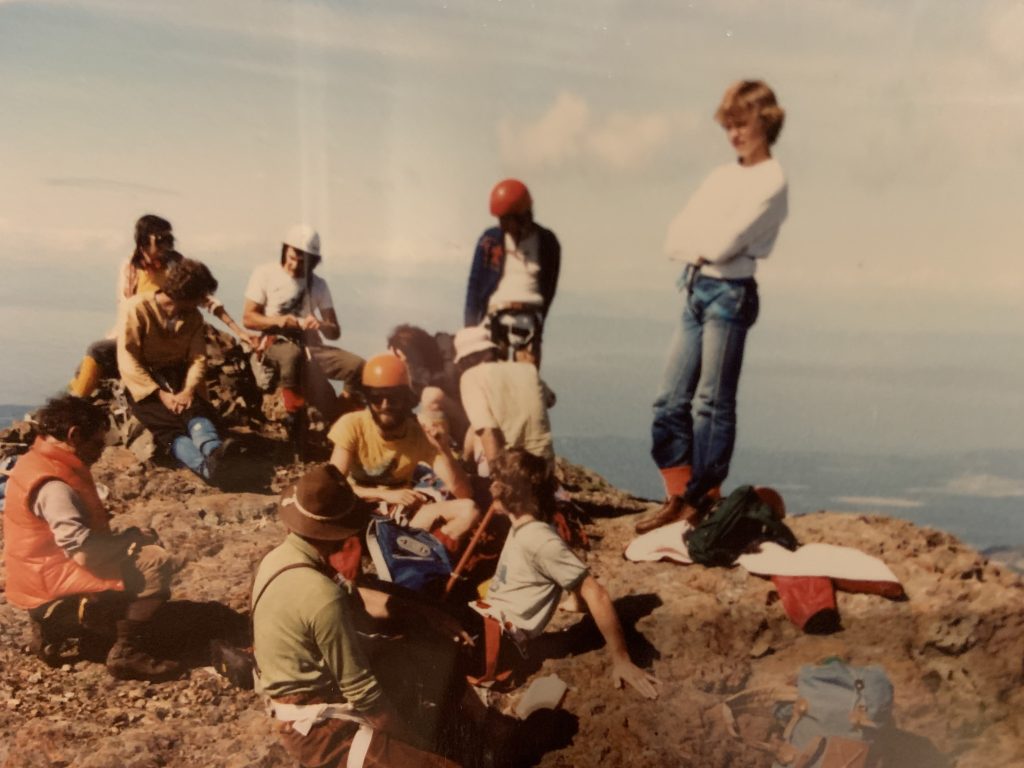 On the summit of Mt. Arrowsmith. Albert Hestler in felt hat, Brian Money in orange helmet and Jim Sandford standing on the right – Brian Money photo.