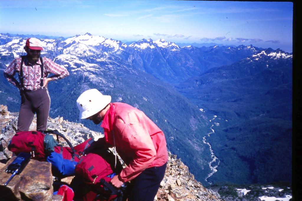 Gary Allen and Brian Money on the summit of Big Interior Mountain with Bedwell River below 1987 – Chris Schreiber photo.