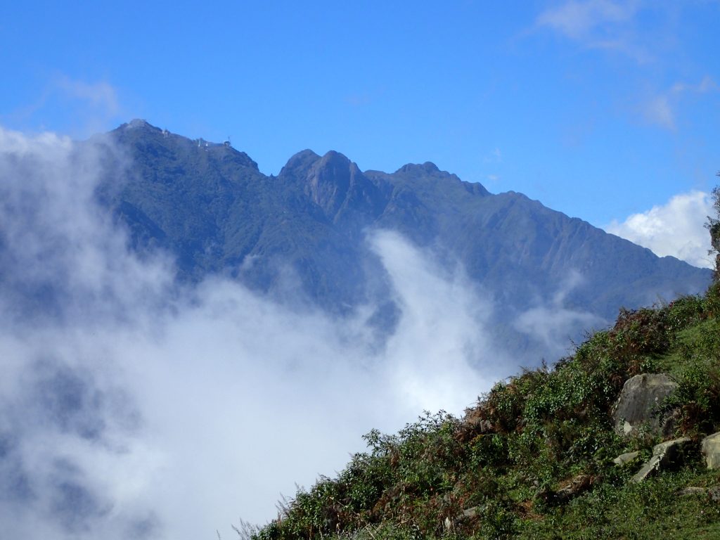 Looking up at the summit of Vietnams highest mountain Fansipan 2016 – Lindsay Elms photo.