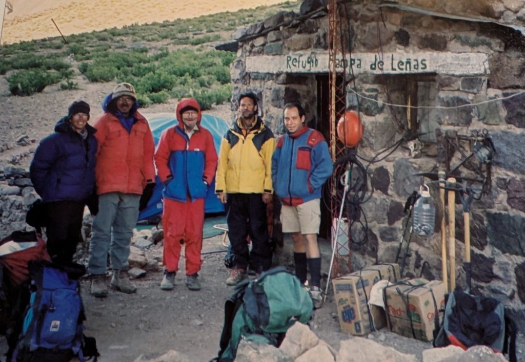 Sylvia Moser, Mike Hubbard, Don Morton, Charles Turner and&nbsp;unknown at refugio after descending Aconcagua 2001 – Mike Hubbard photo.