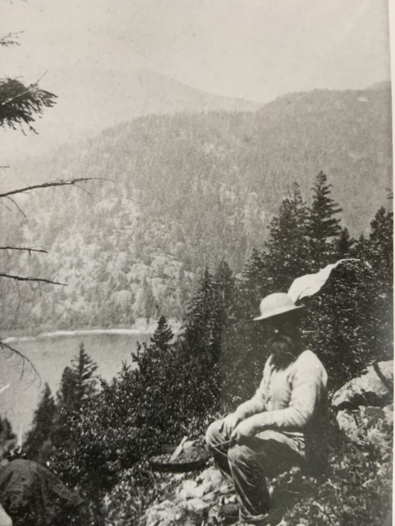 Old time prospector sitting on Copper Mountain (Mt. Hankin) late 1890’s.