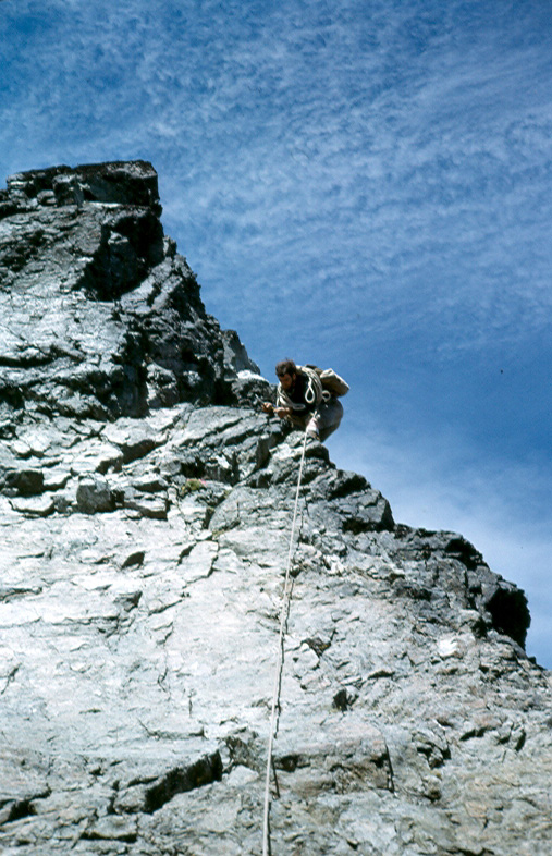 Climber (possibly Ron Facer) on the final ridge to the Southwest Summit of Mt. Colonel Foster, August 1, 1966 - Ralph Hutchinson photo.