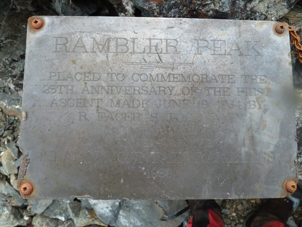 RAMBLER PEAK Placed to commemorate the 25th anniversary of the first ascent made June 19, 1964 by R. Facer, S. Todd and B. McDowell. Members of the Island Mountain Ramblers 1989 – Lindsay Elms photo.