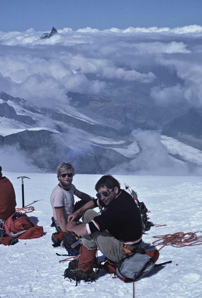 Don Berryman and Dave Hobill having a snack on the descent from Monta Rosa/Dufourspitze with Sandy Briggs in 1983 – Sandy Briggs photo.