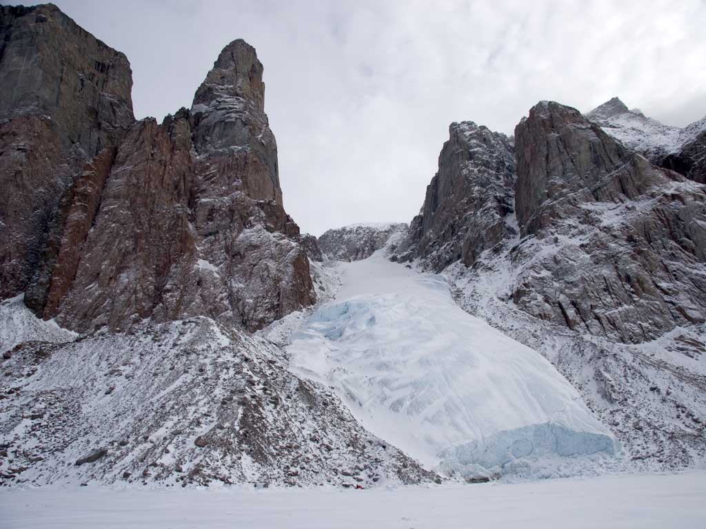 Camp near a side glacier of Gibbs Fiord, eastern Baffin Island. For scale, you may be able to pick out the red dot of our tent about the middle of the photo 2007 – Sandy Briggs photo.