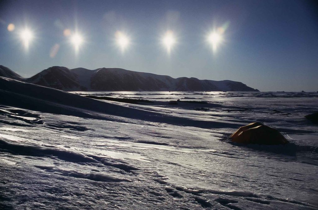Five exposures of the midnight sun from camp on the east coast of Ellesmere Island en-route to Coburg Island 2005 – Sandy Briggs photo.
