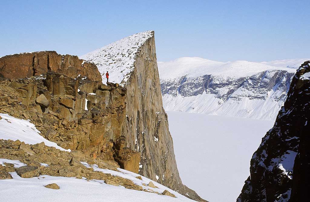 John Dunn on the cliffs of Coronation Fiord, Auyuittuq National Park 2002 – Sandy Briggs photo.