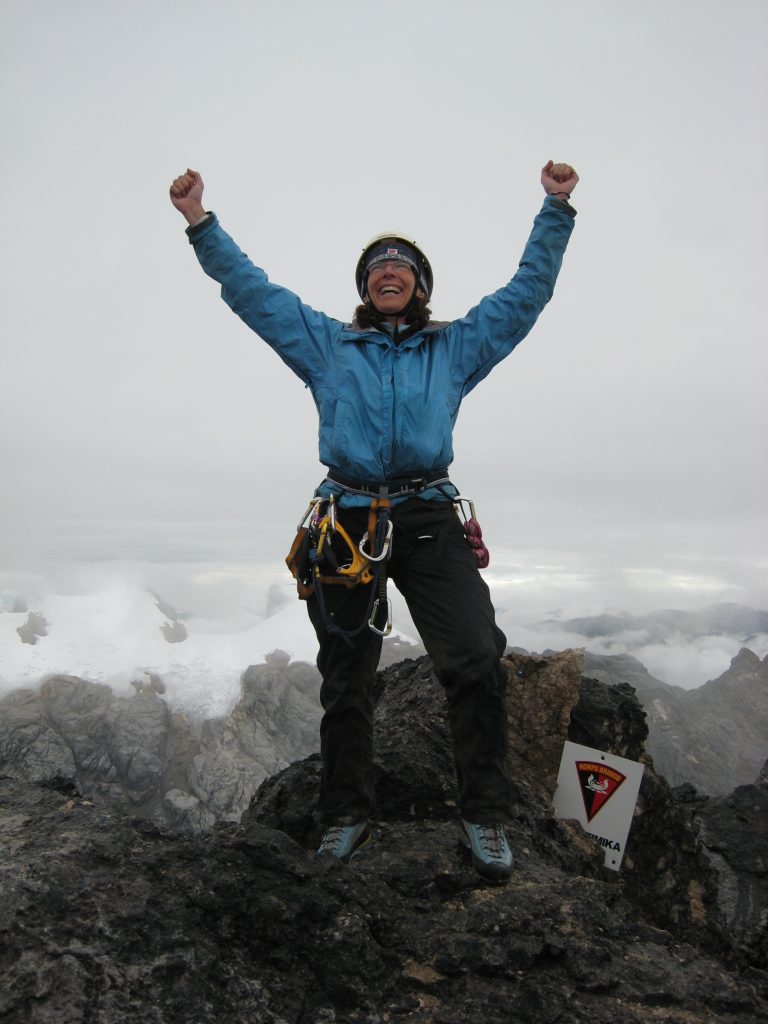 Sylvia Moser on the summit of Puncak Jaya/Cartensz Pyramid in Indonesia 2006 – Sylvia Moser photo.