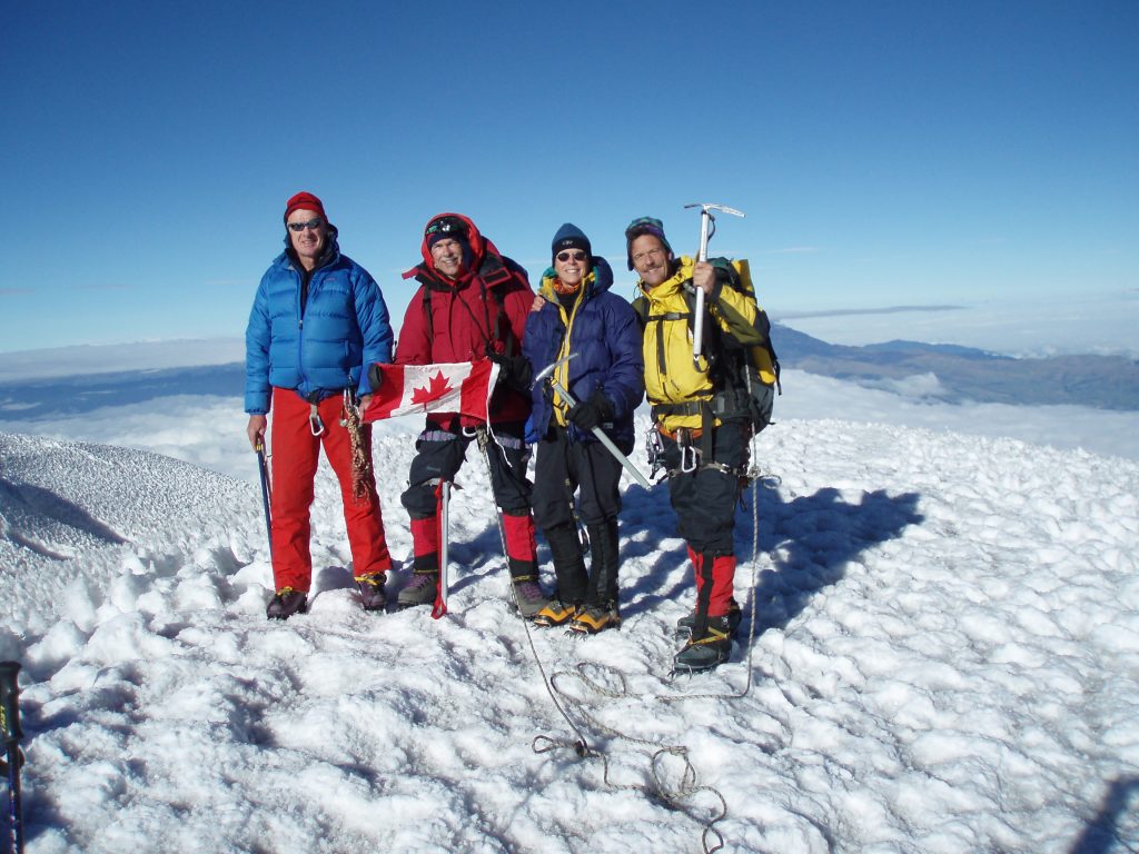 Russ Moir, Tony Vaughn, Sylvia Moser and Charles Turner on the summit of Cotopaxi in Ecuador 2007 – Sylvia Moser photo.