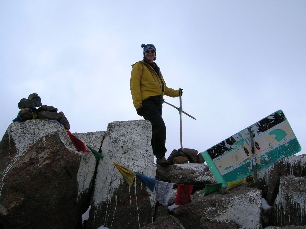 Sylvia Moser on the summit of Nelion Peak on Mt. Kenya 2006 – Sylvia Moser photo.