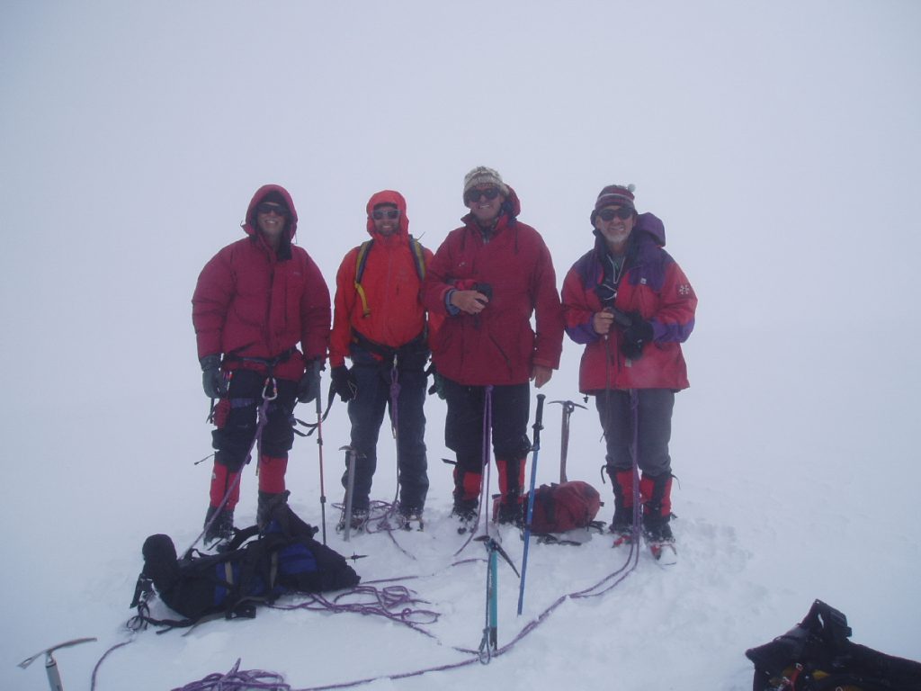 Mike Hubbard and 3 others on the summit of Nairamdal/Friendship Peak in Mongolia 2006 – Tony Vaughn photo.