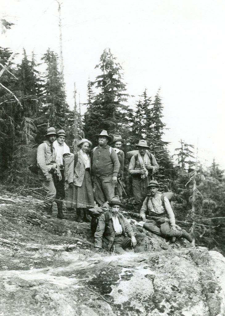 Expedition members hiking in to Crown Mountain 1910.